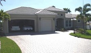 Example of a Cape Coral Gulf access waterfront home in the Cape Coral Yacht Club neighborhood behind a bridge